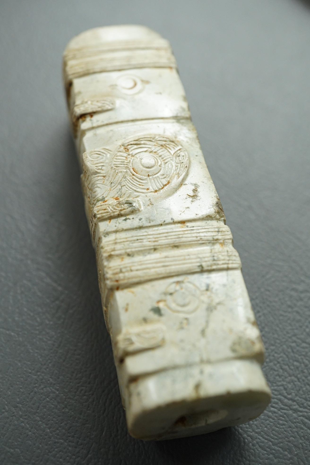 Four Chinese archaistic hardstone or burnt jade cong or cylinders